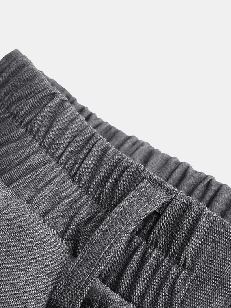 Męskie Spodnie W Stylu Vintage Przycięte W Jednolitym Kolorze Nieregularne Obszycie W Pasie Modne Spodnie Do Łydki