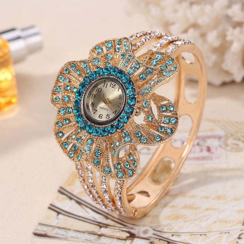 Moda Crystal Flower Shape Dial Hollow Metalowy Pasek Damski Zegarek Kwarcowy