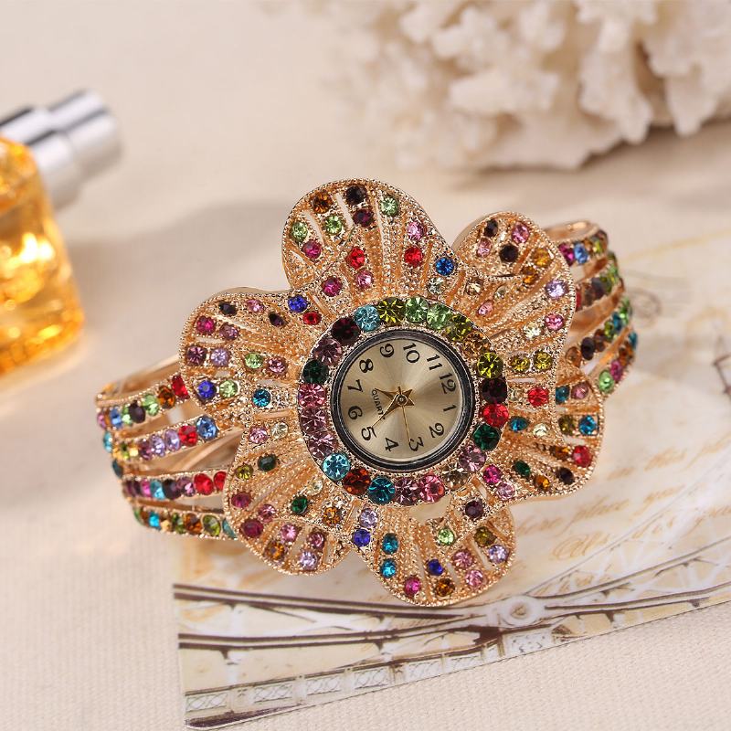 Moda Crystal Flower Shape Dial Hollow Metalowy Pasek Damski Zegarek Kwarcowy