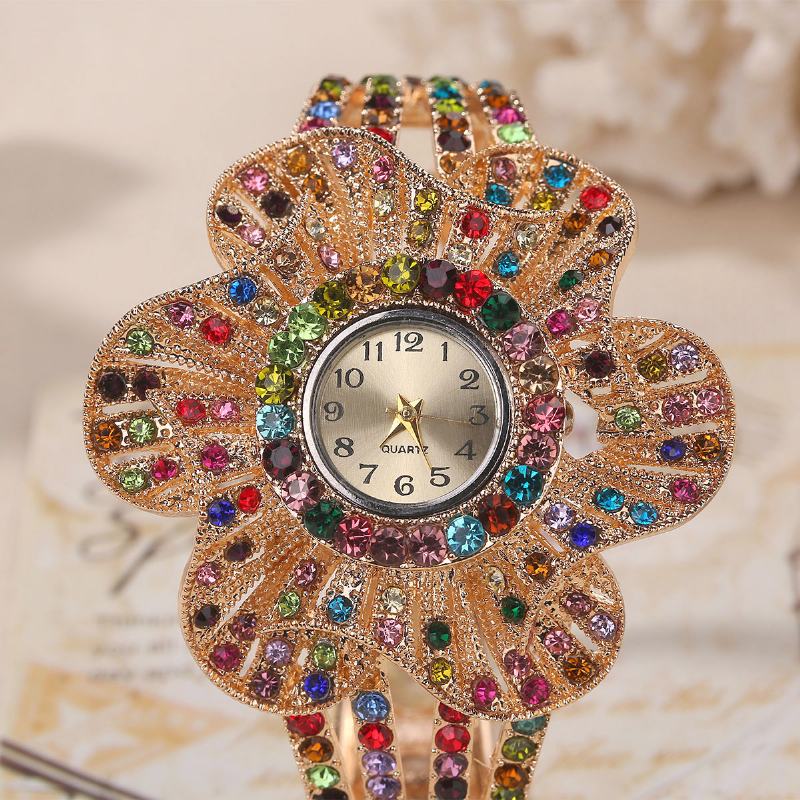 Moda Crystal Flower Shape Dial Hollow Metalowy Pasek Damski Zegarek Kwarcowy